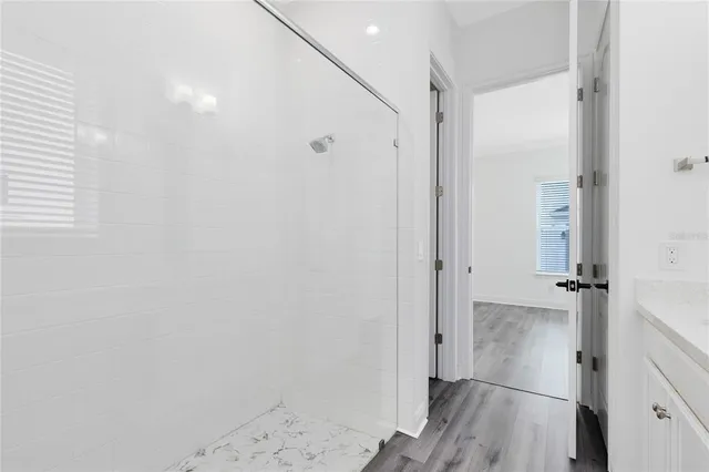 an empty room with wooden floor