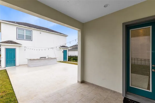 a view of a bedroom with a bed and cabinets