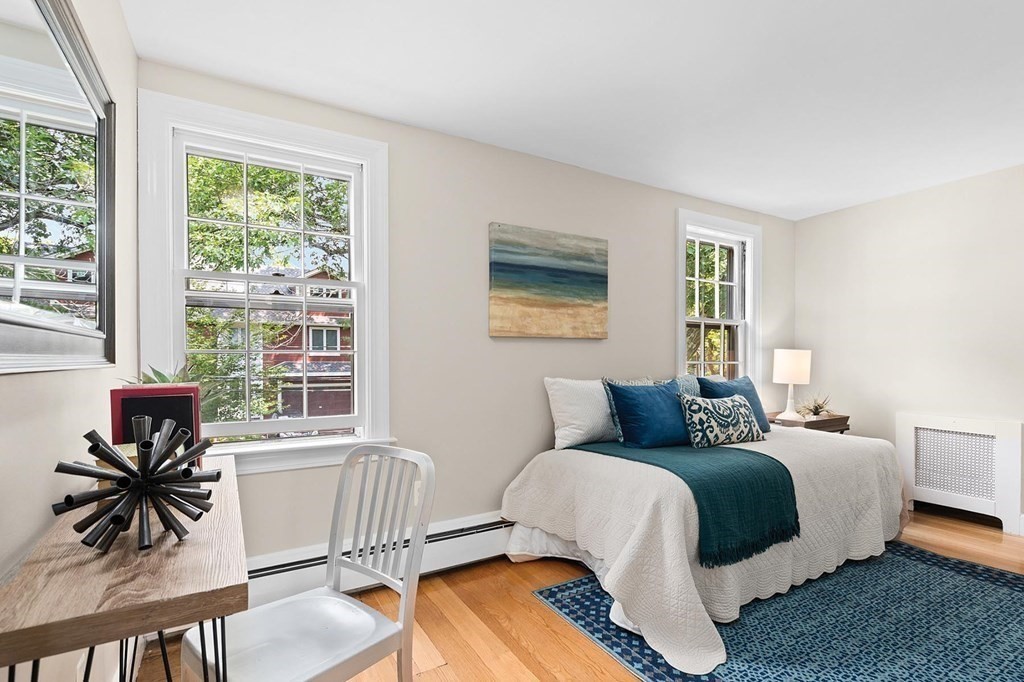 27 Conant Road Brookline, MA 02467 - Photo 14 of 23 a bedroom with a bed and wooden floor