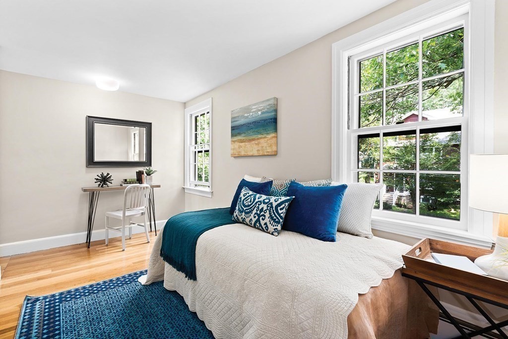27 Conant Road Brookline, MA 02467 - Photo 15 of 23 a bedroom with a bed and wooden floor