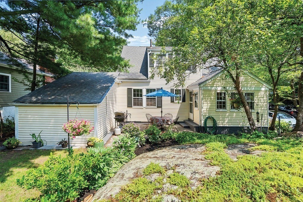 27 Conant Road Brookline, MA 02467 - Photo 22 of 23 a front view of a house with a yard