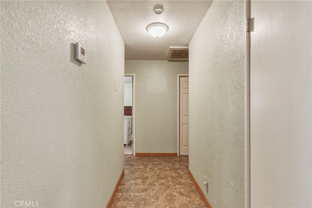 6812 Helton Street Winton, CA 95388 - Photo 14 of 24 a view of a hallway