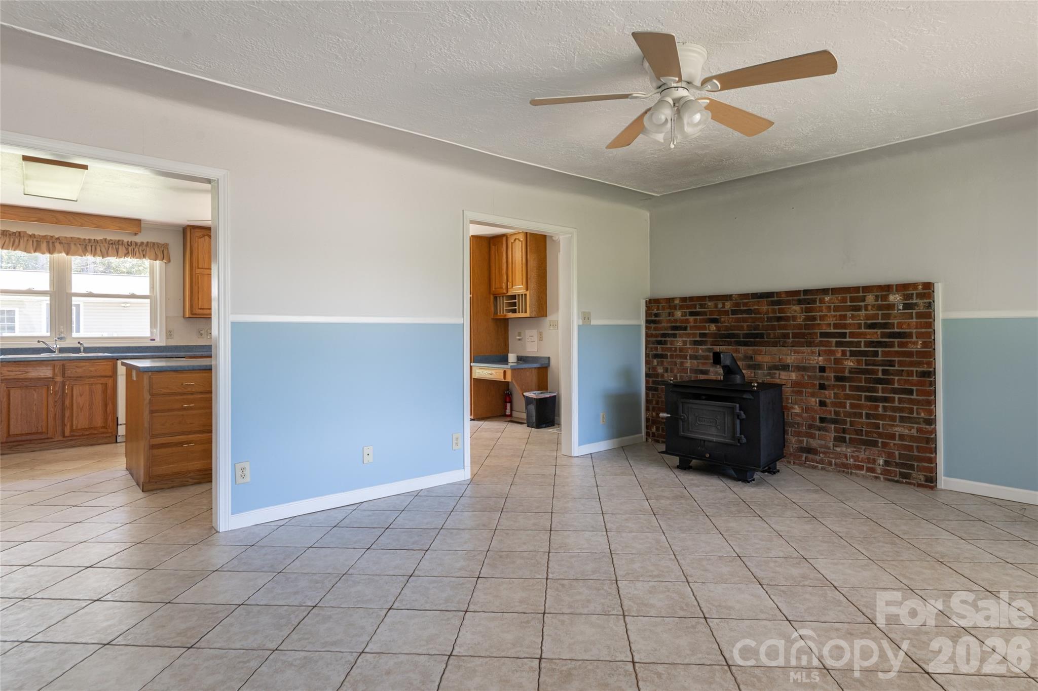 2800 Coxe Road Tryon, NC 28782 - Photo 5 of 40 an empty room with furniture and windows