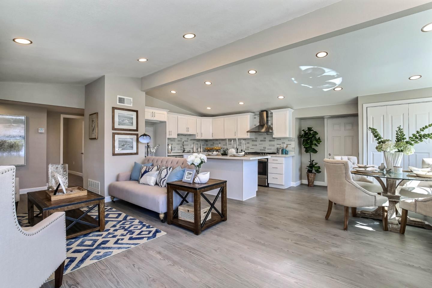18911 Arata Way Cupertino, CA 95014 - Photo 1 of 18 a living room with furniture and kitchen view