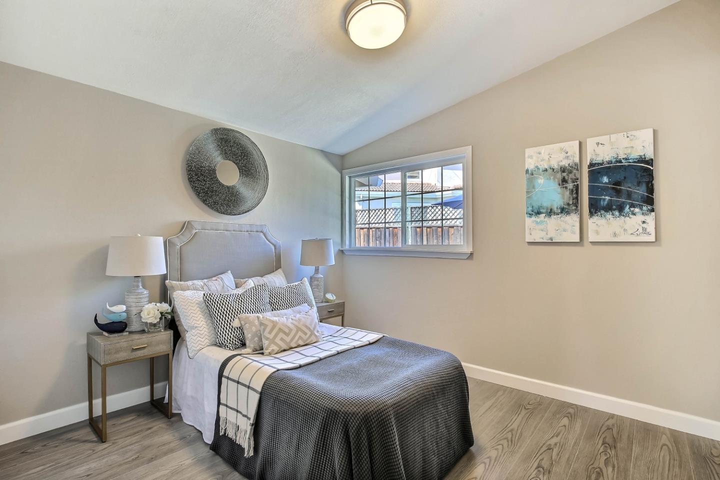 18911 Arata Way Cupertino, CA 95014 - Photo 12 of 18 a bedroom with bed and a window