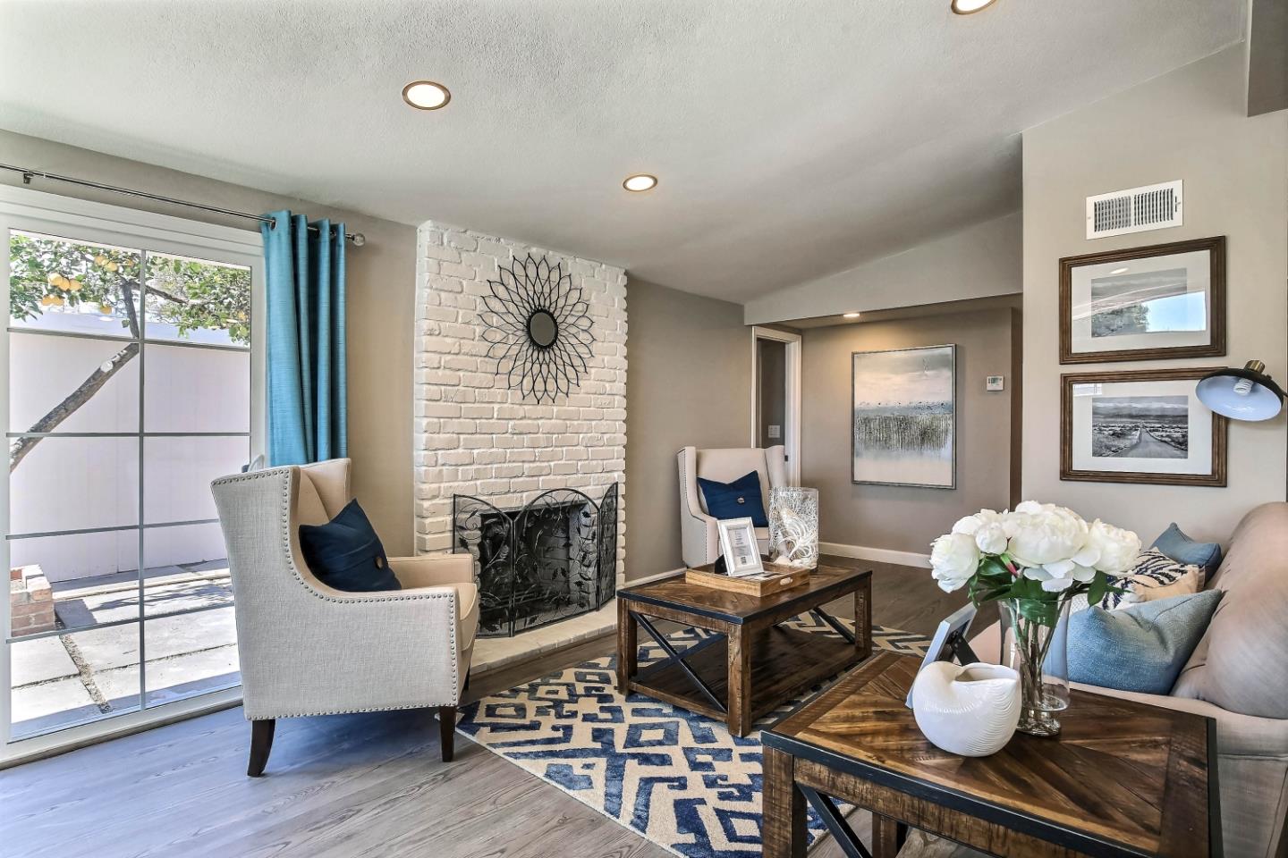 18911 Arata Way Cupertino, CA 95014 - Photo 2 of 18 a living room with furniture rug and window
