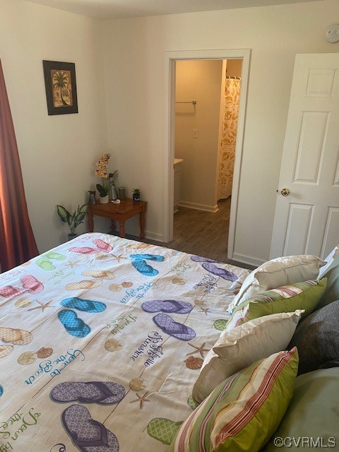 142 Samford Street Alberta, VA 23821 - Photo 12 of 24 a bedroom with a bed and a mirror