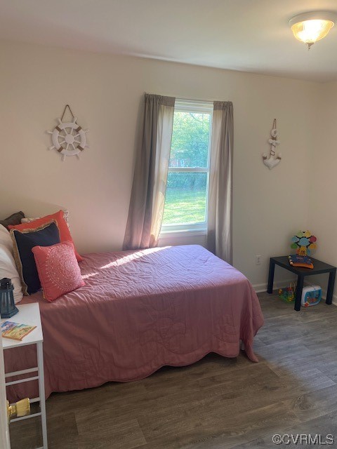 142 Samford Street Alberta, VA 23821 - Photo 17 of 24 a bedroom with a bed and a window