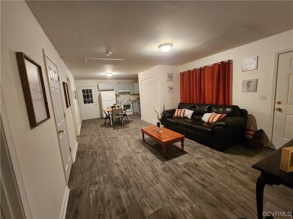 142 Samford Street Alberta, VA 23821 - Photo 5 of 24 a living room with furniture and a wooden floor