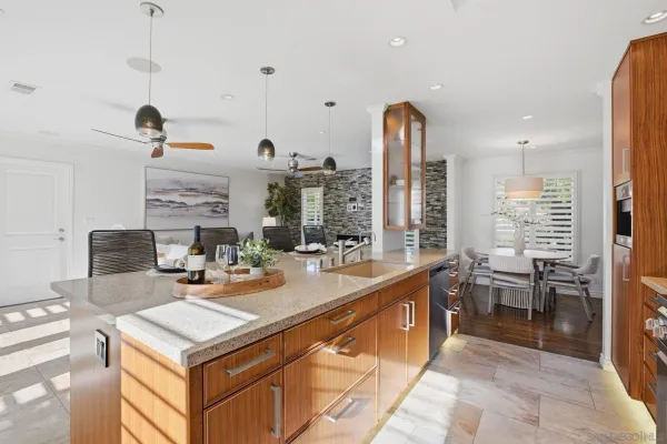 a very nice looking dining room with a large window