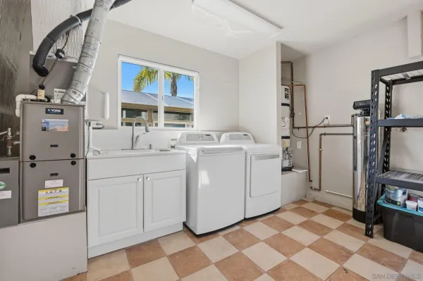 a utility room with cabinets