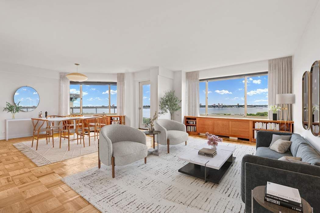 60 Riverside Drive, Unit 19C Manhattan, NY 10024 - Photo 1 of 16 a living room with furniture and a large window