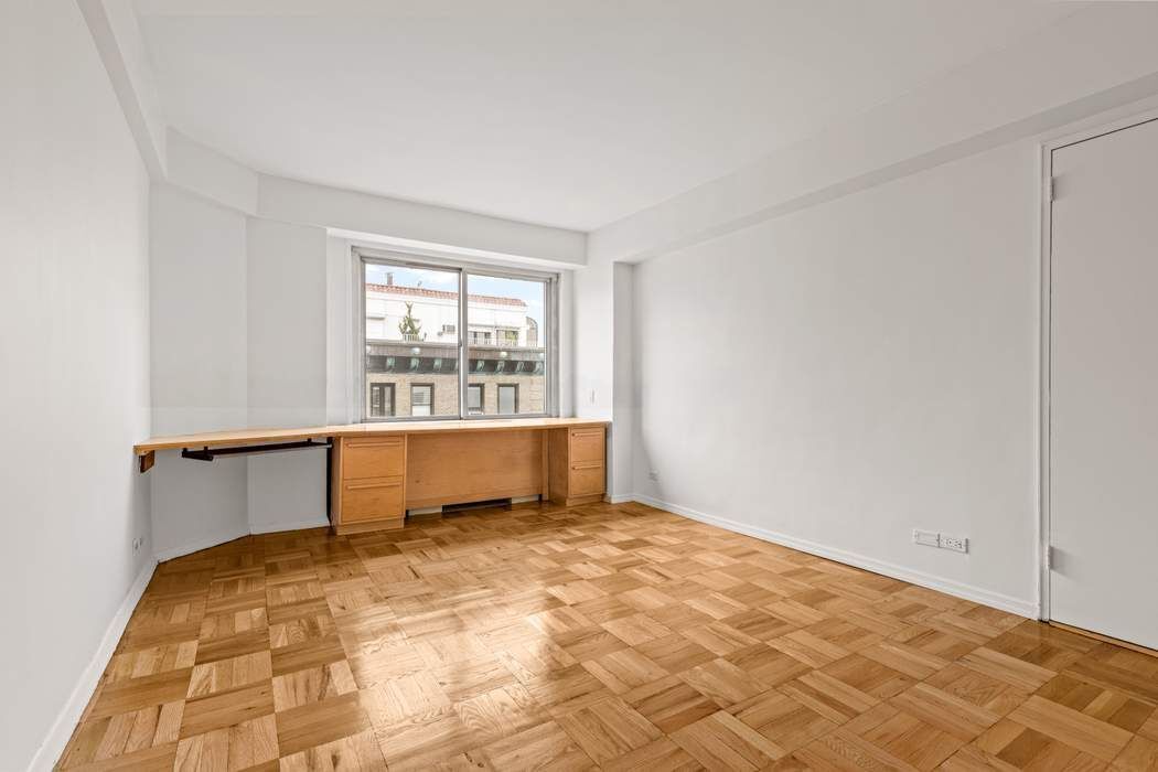 60 Riverside Drive, Unit 19C Manhattan, NY 10024 - Photo 16 of 16 a view of an empty room with a window
