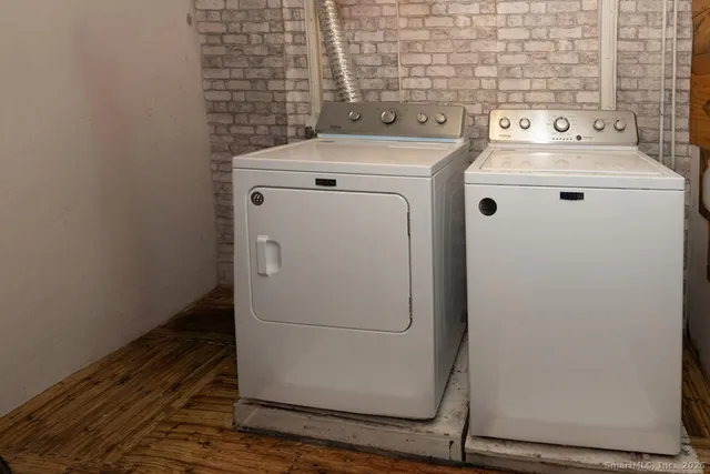a view of workspace with wooden floor