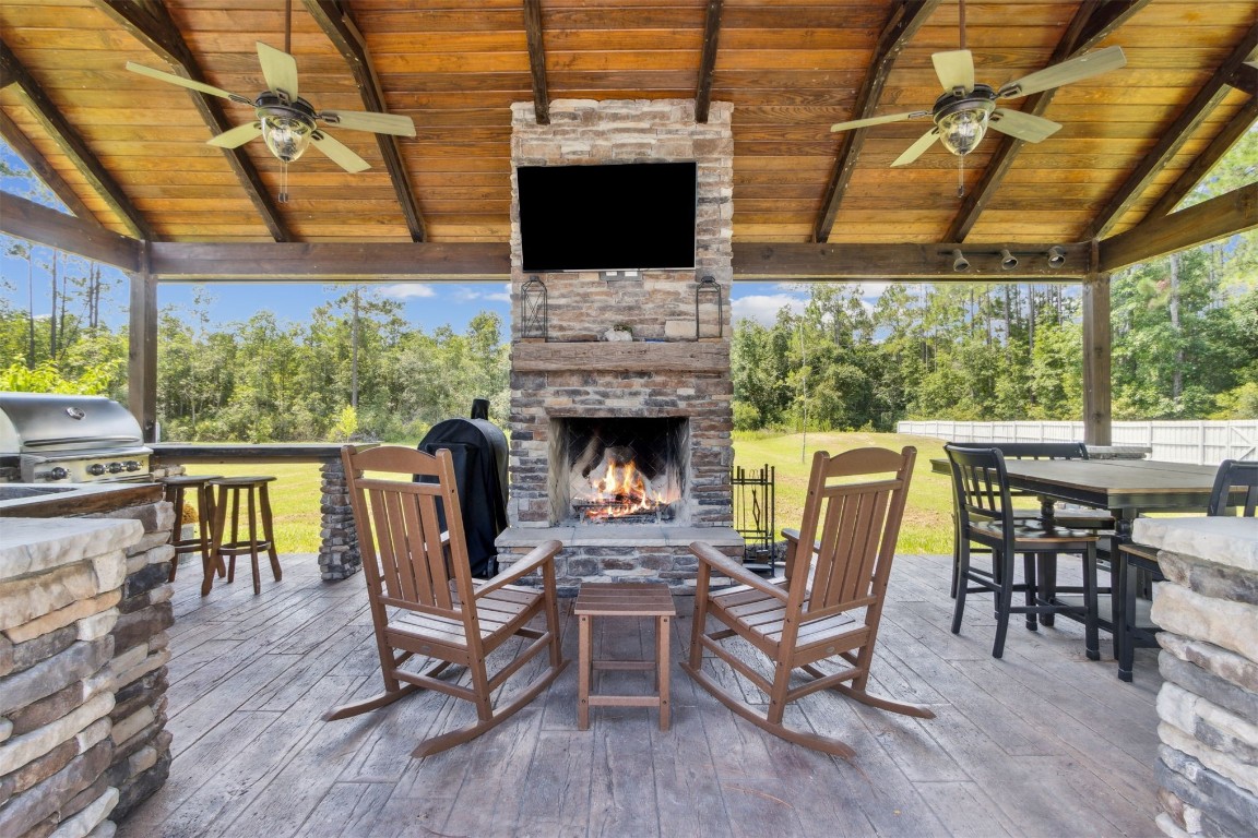 37221 Poole Road Hilliard, FL 32046 - Photo 26 of 67 a view of a dining room with furniture and chandelier