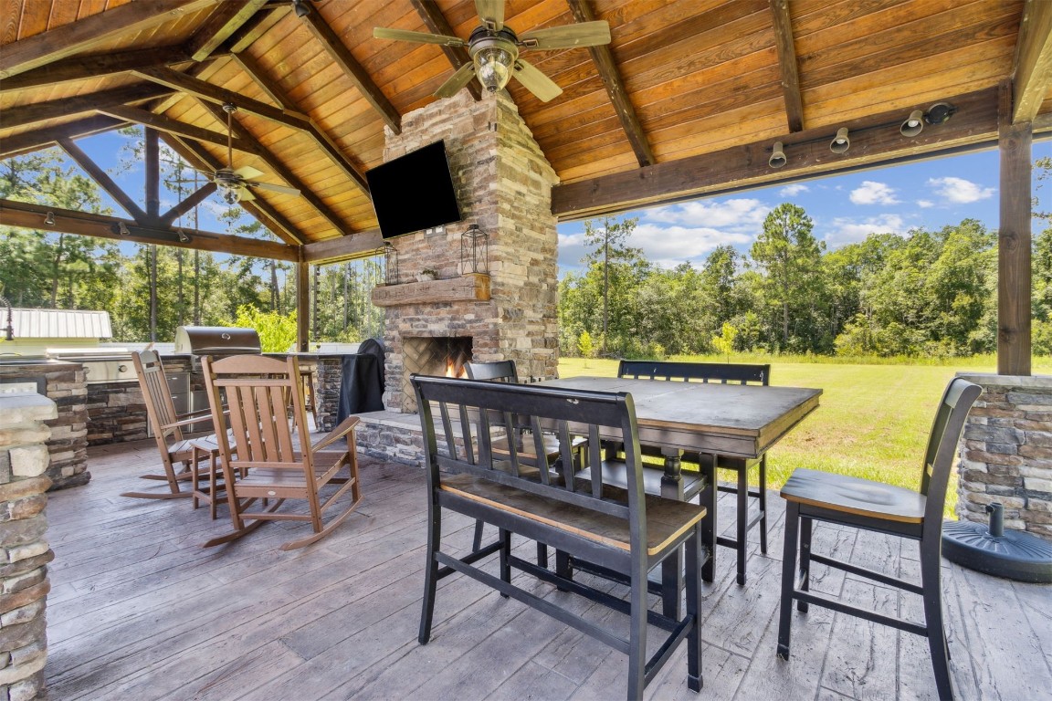 37221 Poole Road Hilliard, FL 32046 - Photo 27 of 67 a view of an outdoor sitting area with furniture