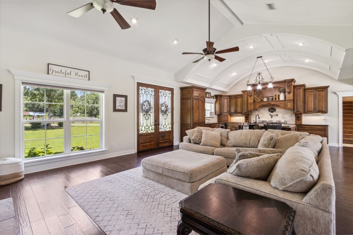 37221 Poole Road Hilliard, FL 32046 - Photo 5 of 67 a living room with furniture and a large window