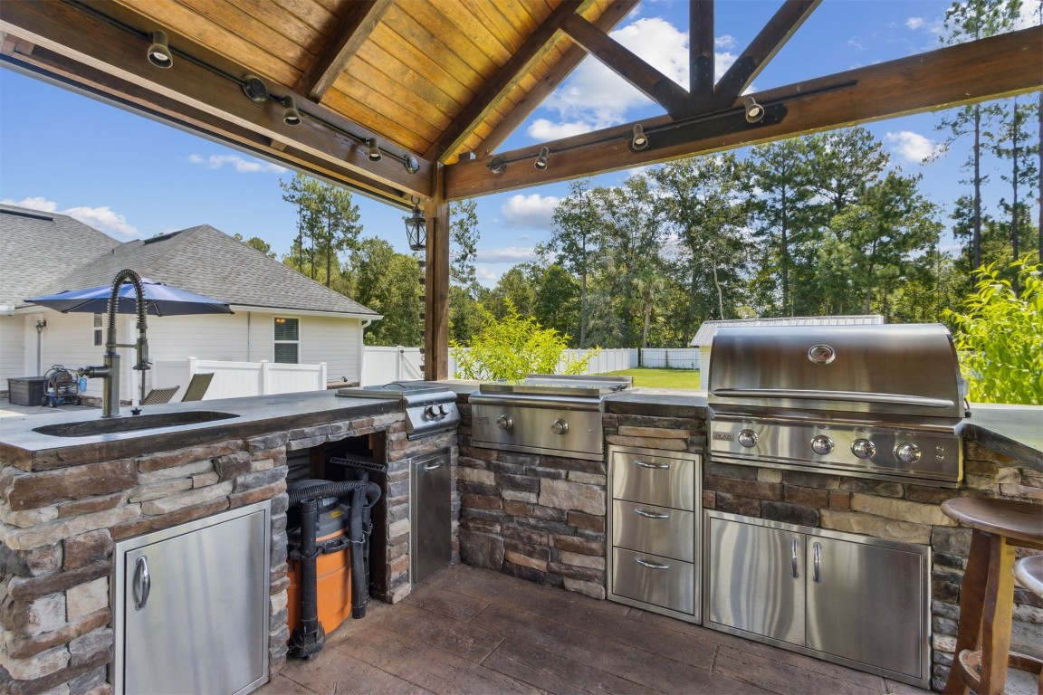 37221 Poole Road Hilliard, FL 32046 - Photo 53 of 67 a view of a chairs and table in the balcony