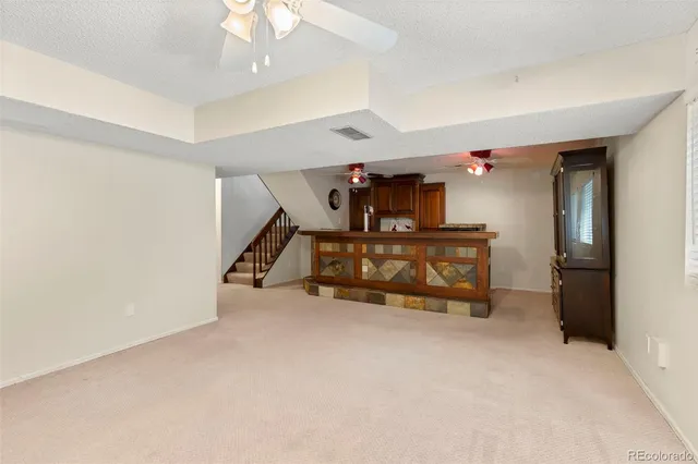 a view of a livingroom with a furniture