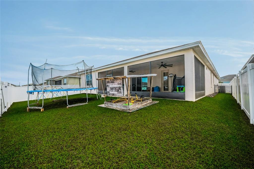 6200 Southwest 72nd Terrace Ocala, FL 34474 - Photo 16 of 70 a view of a house with backyard porch and sitting area