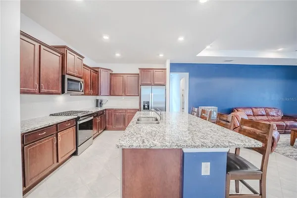 a view of hall way with furniture