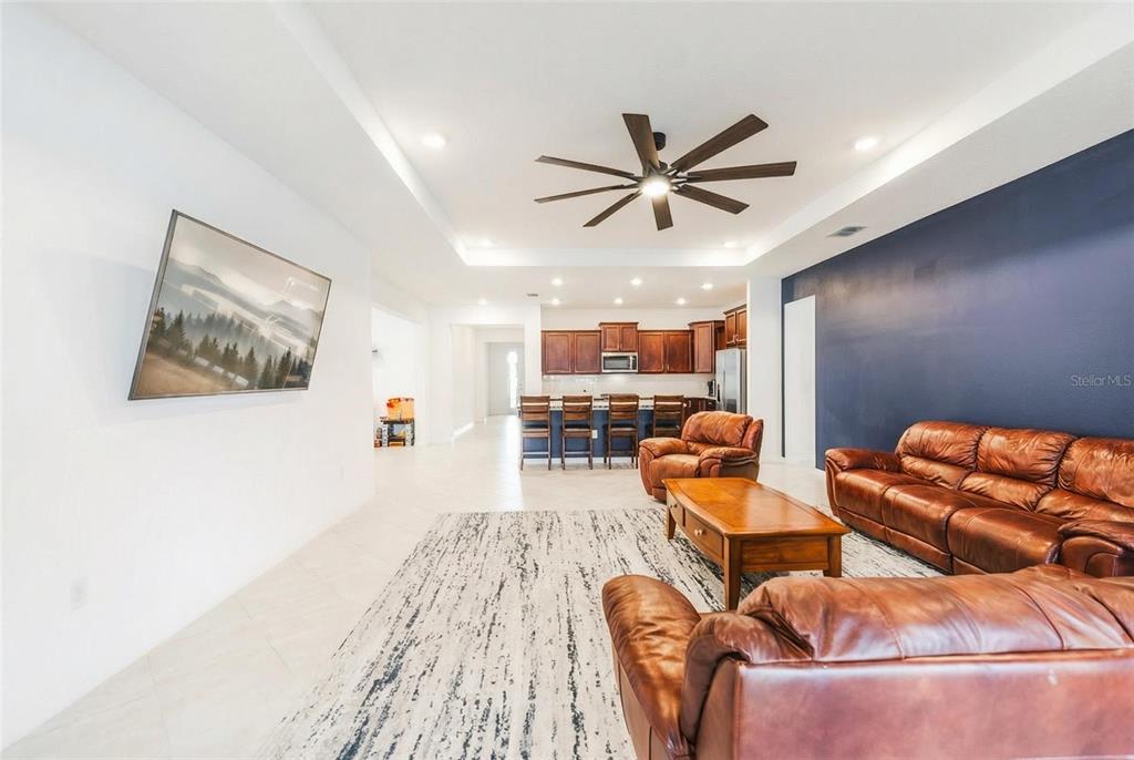 6200 Southwest 72nd Terrace Ocala, FL 34474 - Photo 28 of 70 a living room with furniture and a wooden floor