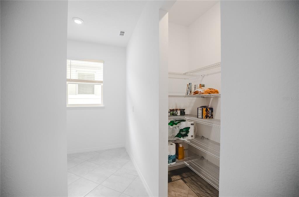 6200 Southwest 72nd Terrace Ocala, FL 34474 - Photo 32 of 70 a room with a white walls and a window