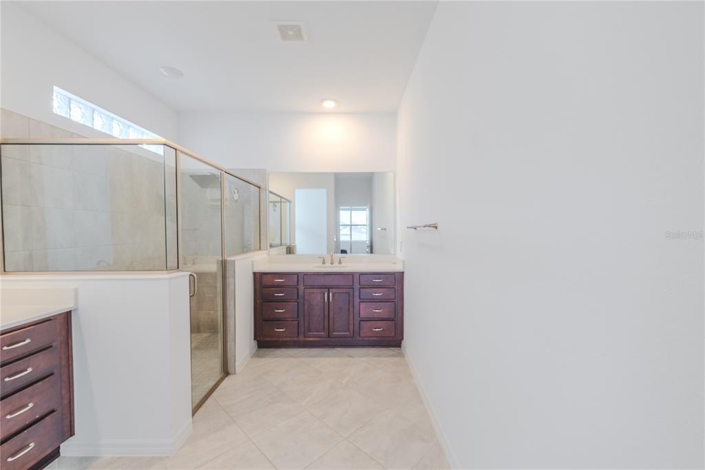 6200 Southwest 72nd Terrace Ocala, FL 34474 - Photo 35 of 70 a bathroom with a sink and a mirror