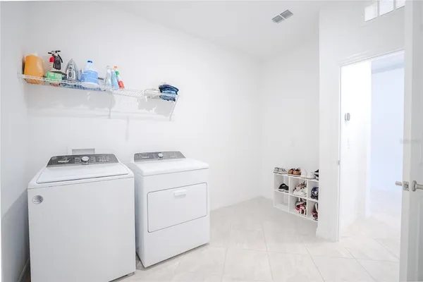 an empty room with a bathroom