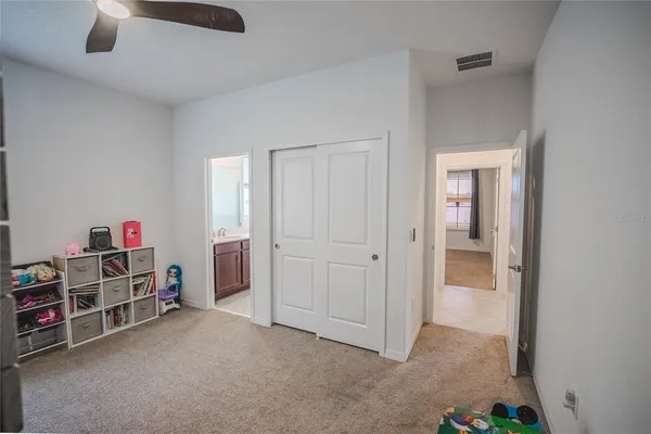 a view of a garage with a bike and storage