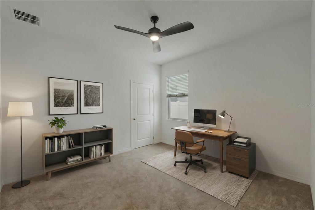 6200 Southwest 72nd Terrace Ocala, FL 34474 - Photo 55 of 70 a view of a workspace with a window and a ceiling fan