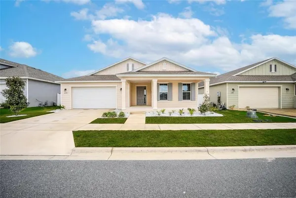a view of a city with lawn chairs