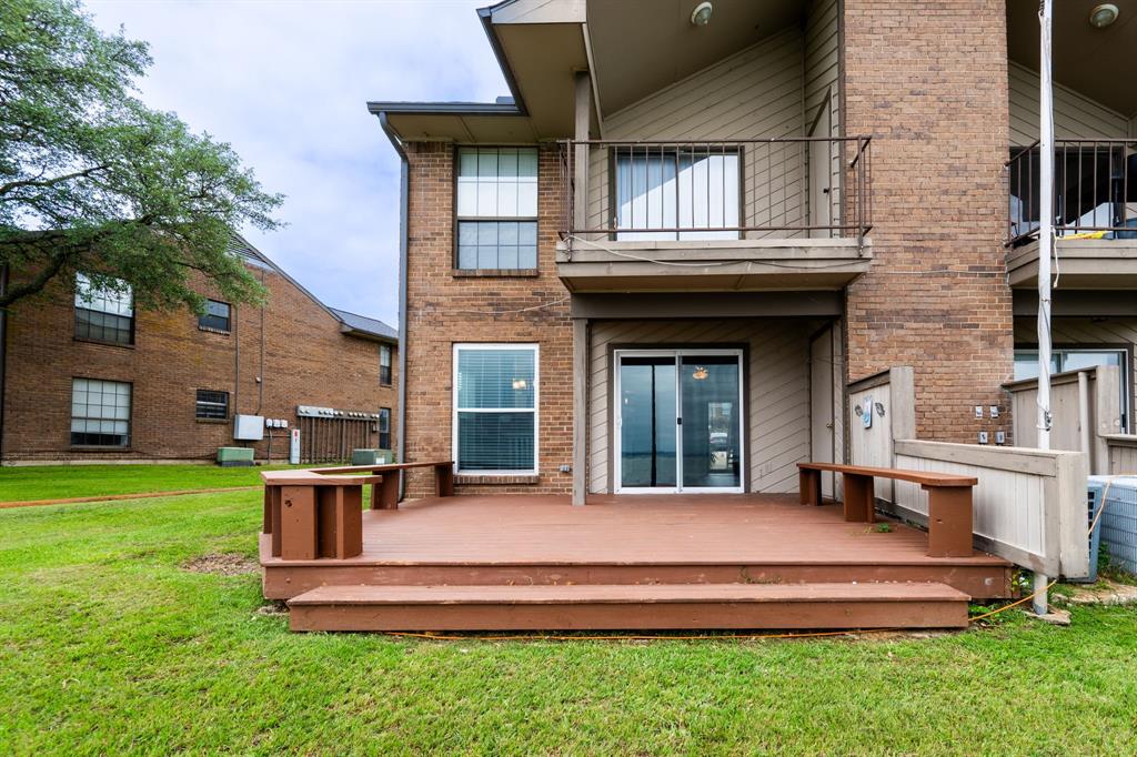 4610 Chaha Road, Unit 106 Garland, TX 75043 - Photo 21 of 25 a view of a house with a yard porch and sitting area