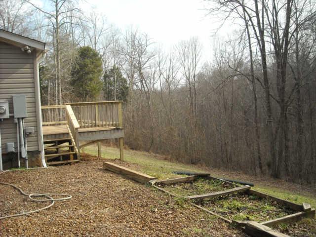 1008 Perry Road Chapmansboro, TN 37035 - Photo 19 of 20 View of rear Deck and back yard