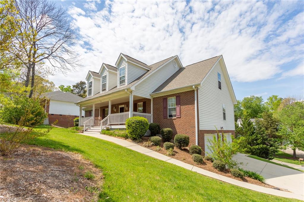705 Old Mill Road High Point, NC 27265 - Photo 1 of 27 Perched on a corner, cul-de-sac lot, this home offers large garage, covered front porch and brick with vinyl exterior. Roof 2 years! AC and water heater replaced in 2019!