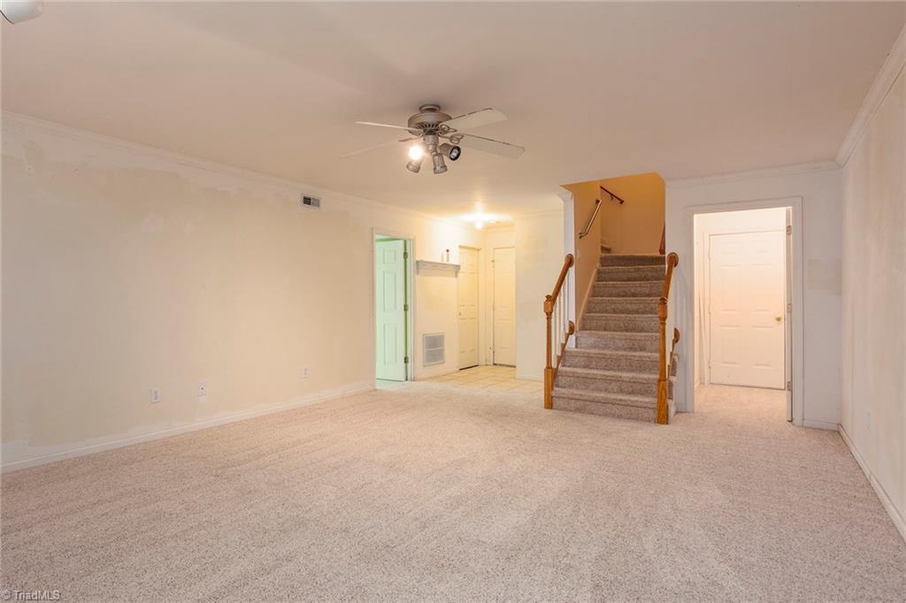 705 Old Mill Road High Point, NC 27265 - Photo 18 of 27 Perfect Den, playroom or turn into a theater room! Dual access doors to garage.