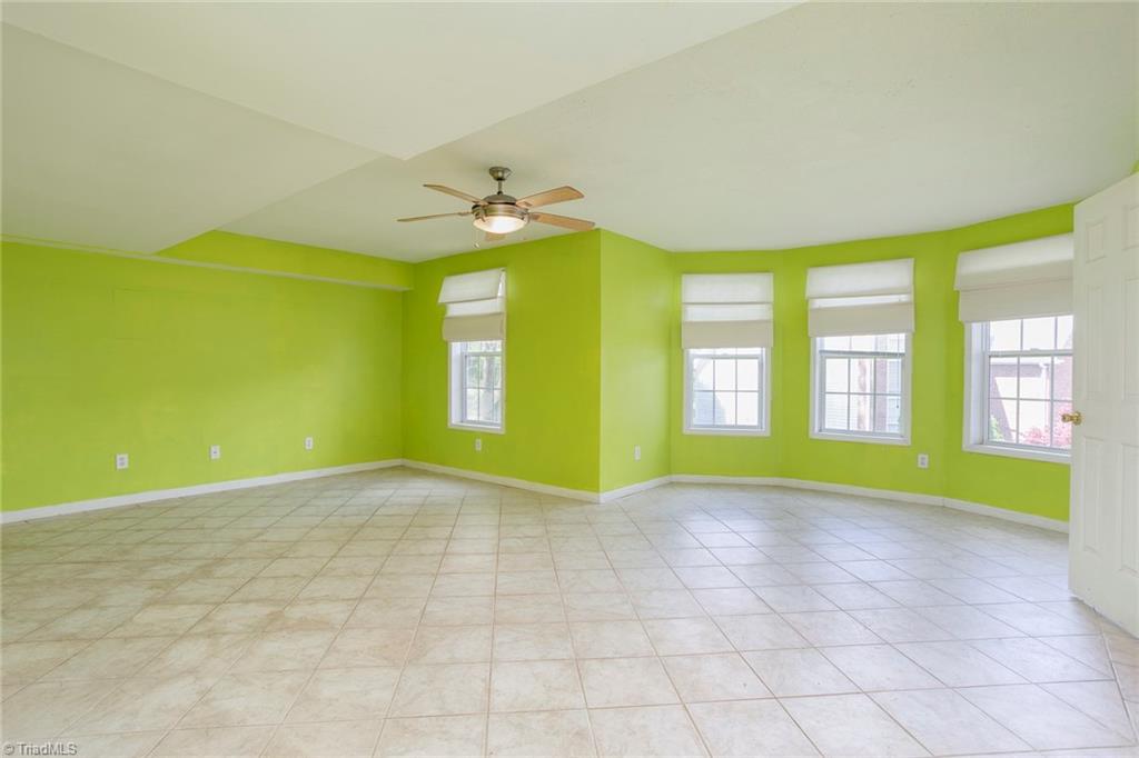 705 Old Mill Road High Point, NC 27265 - Photo 19 of 27 Large lower level bedroom as tile flooring and access to full bath. perfect for Home office or teen suite! No Closet.