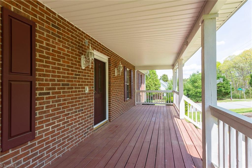 705 Old Mill Road High Point, NC 27265 - Photo 4 of 27 Add a few rocking chairs and enjoy the covered front porch!
