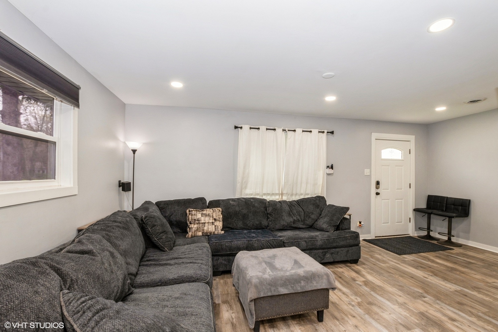 152 Monee Road Park Forest, IL 60466 - Photo 3 of 10 a living room with furniture and a window