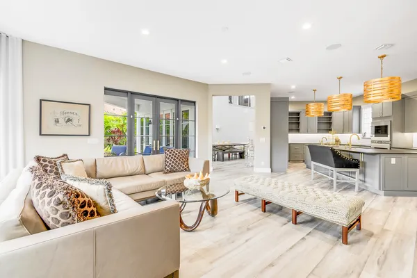 a living room with furniture and a table