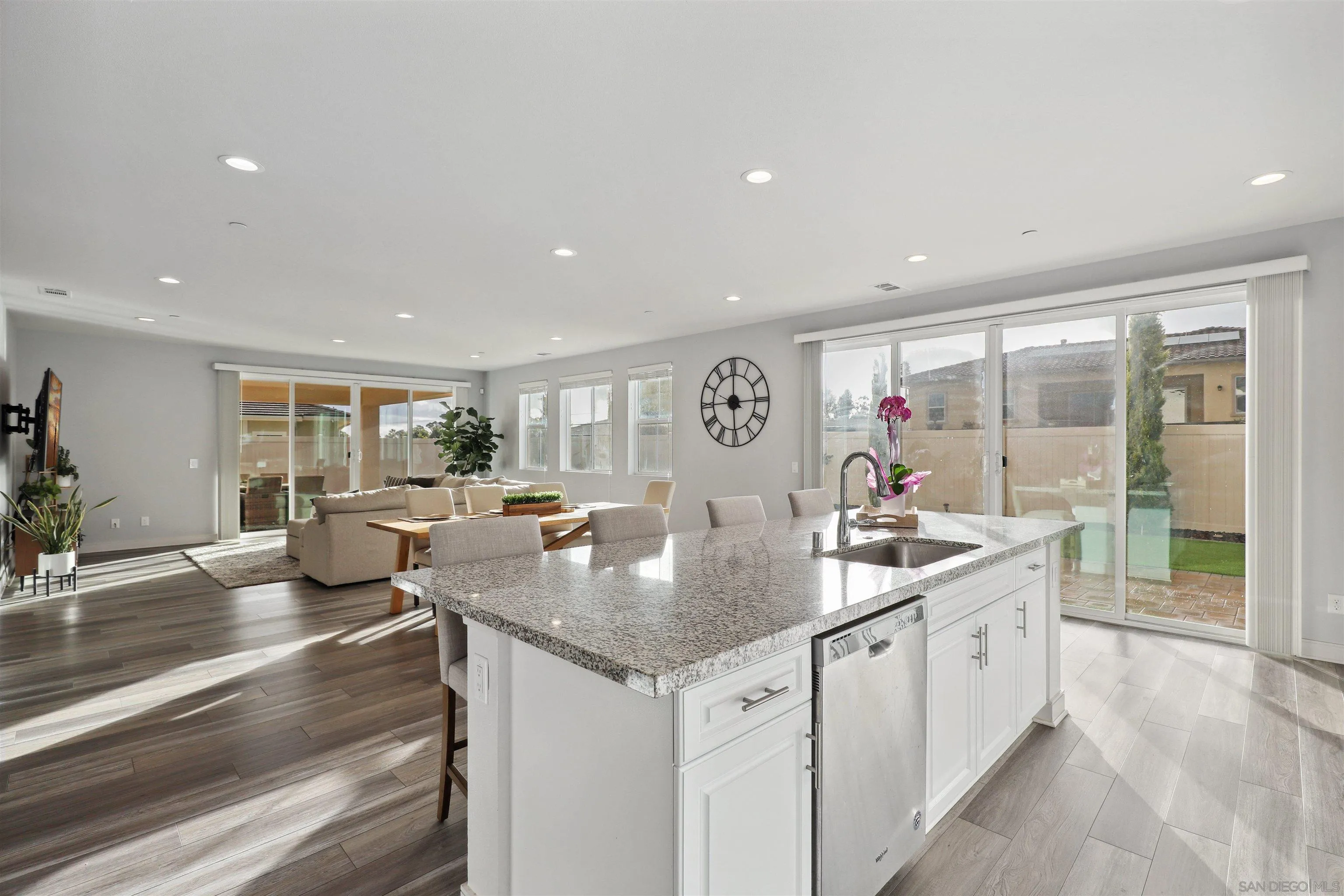 1294 Palomar Circle Escondido, CA 92027 - Photo 15 of 41 a kitchen with sink and view of living room