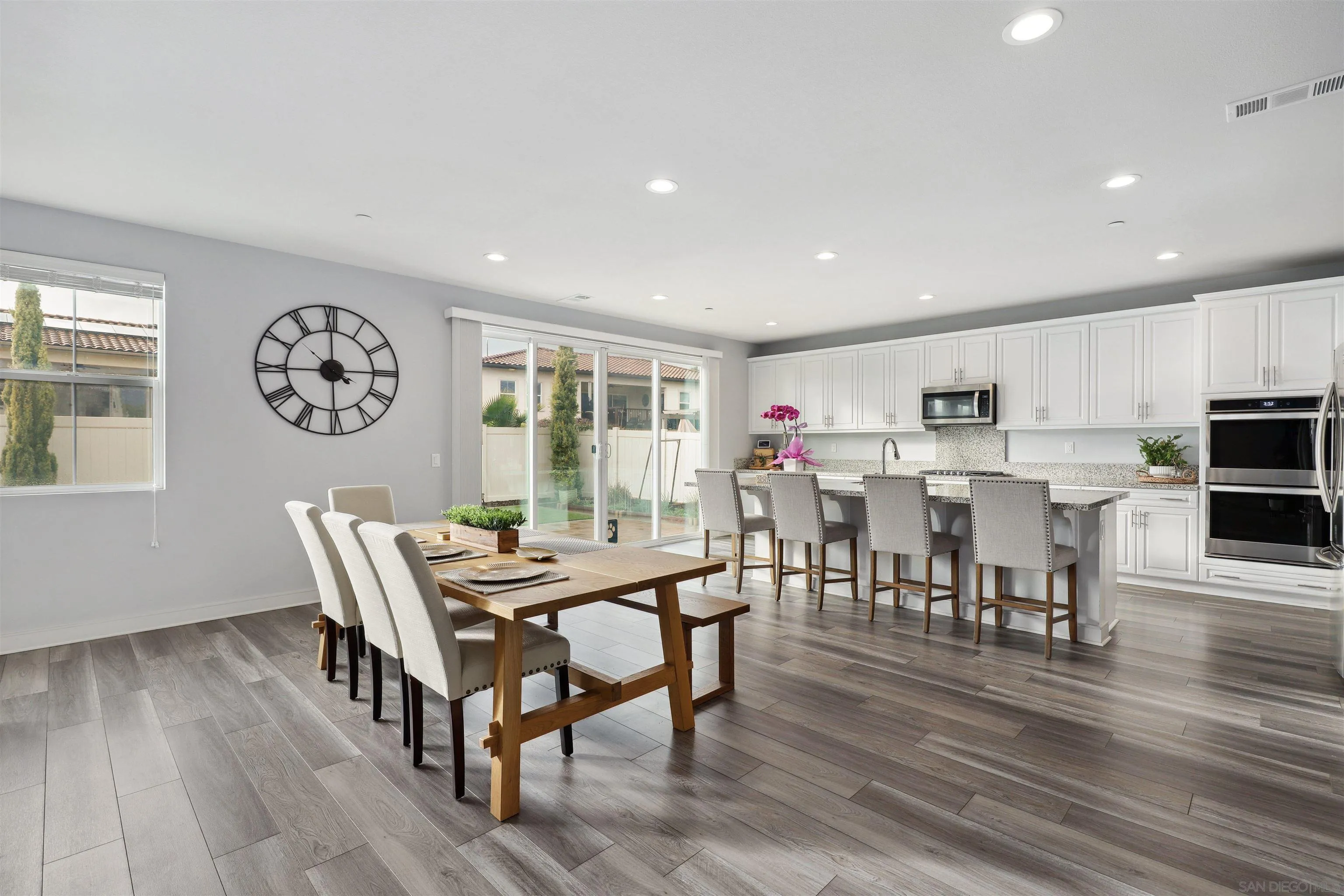 1294 Palomar Circle Escondido, CA 92027 - Photo 17 of 41 a dining room with furniture and wooden floor