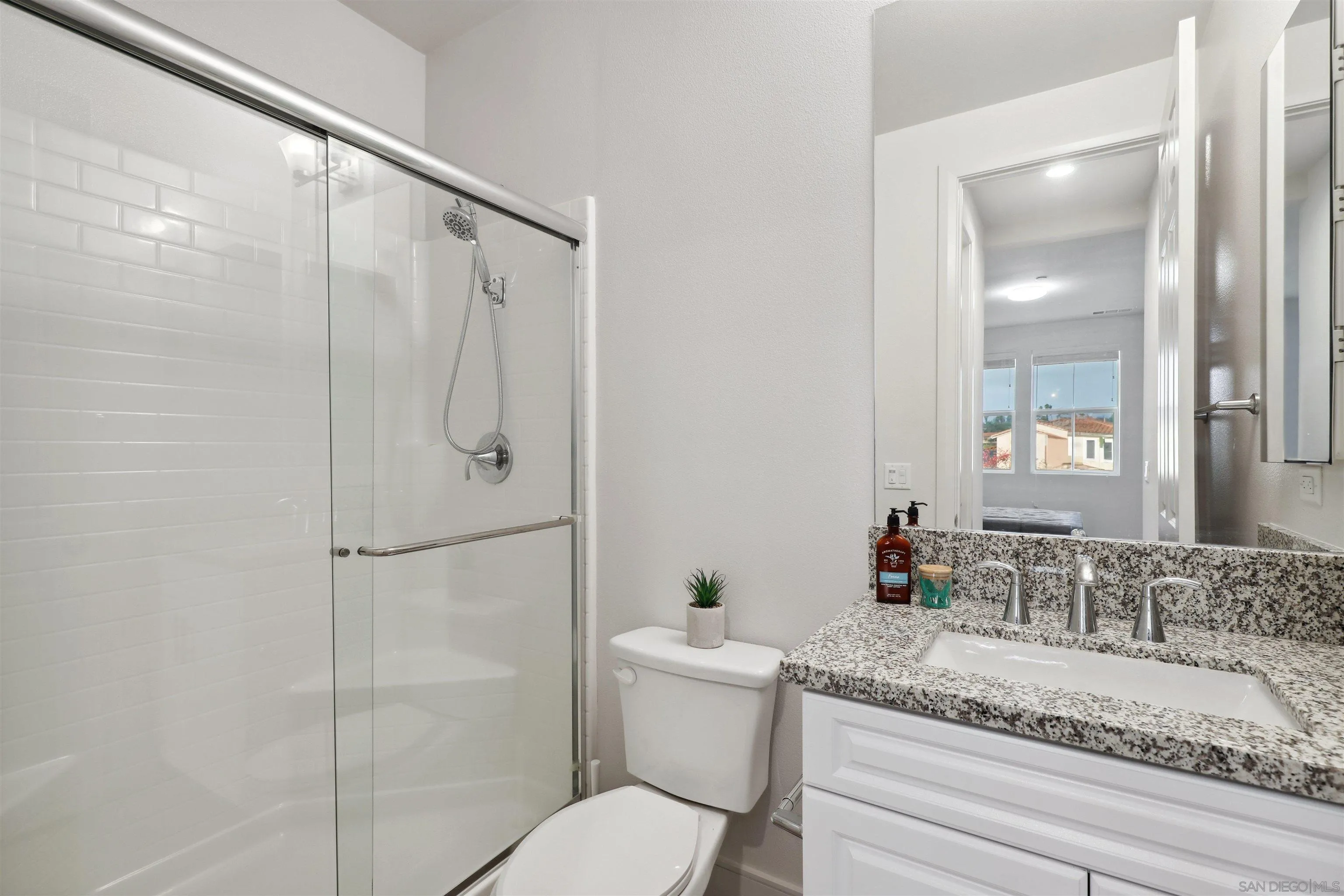 1294 Palomar Circle Escondido, CA 92027 - Photo 19 of 41 a bathroom with a granite countertop sink toilet and shower