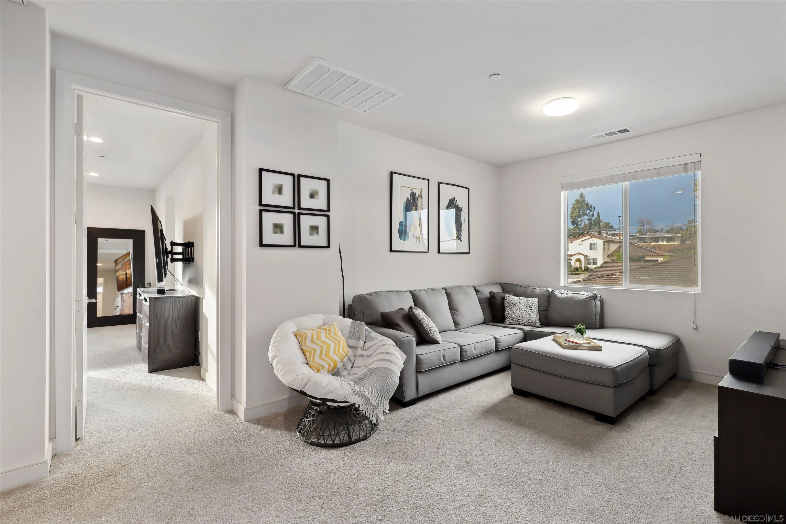 1294 Palomar Circle Escondido, CA 92027 - Photo 21 of 41 a living room with furniture and a window