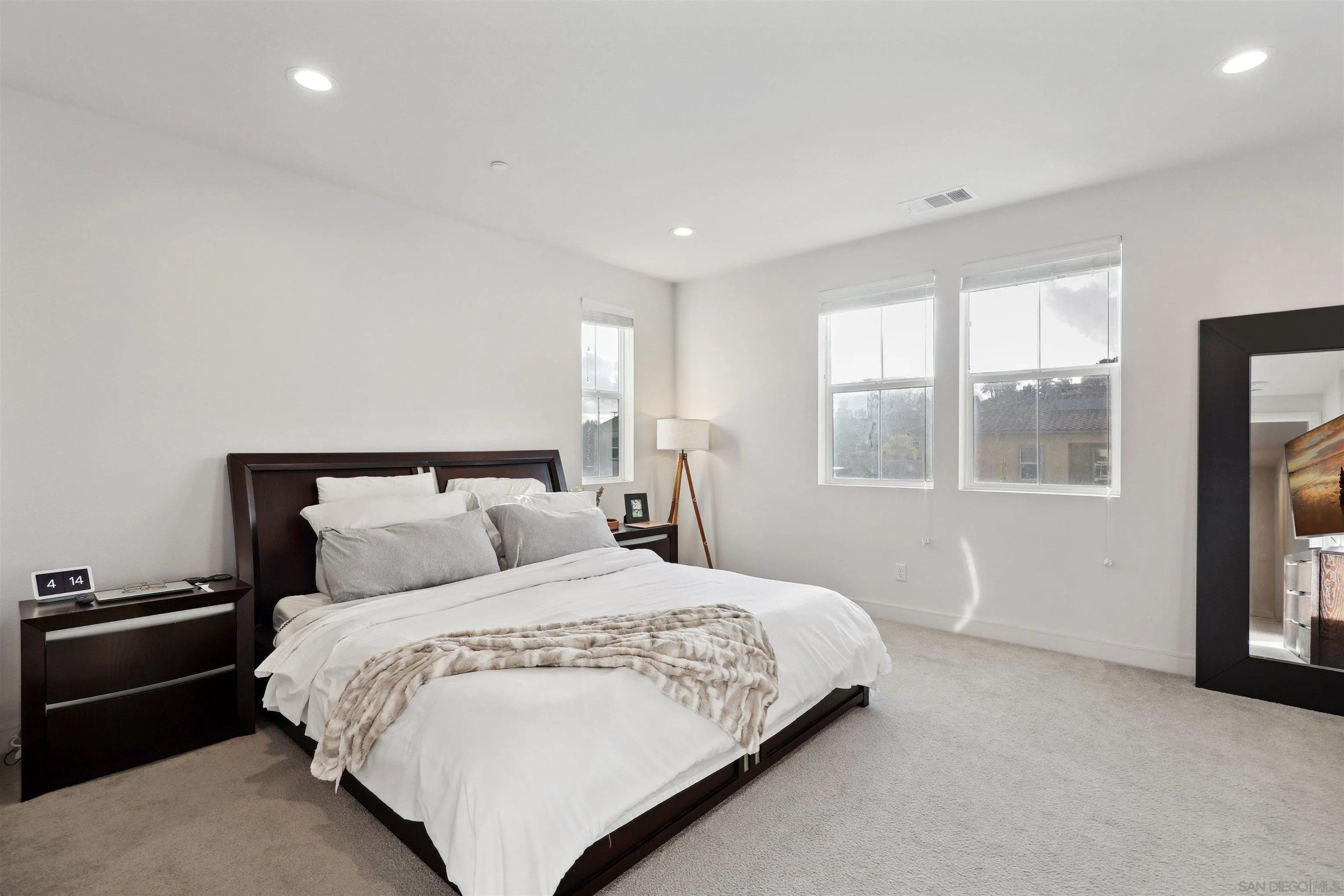 1294 Palomar Circle Escondido, CA 92027 - Photo 23 of 41 a bedroom with a bed and a large window
