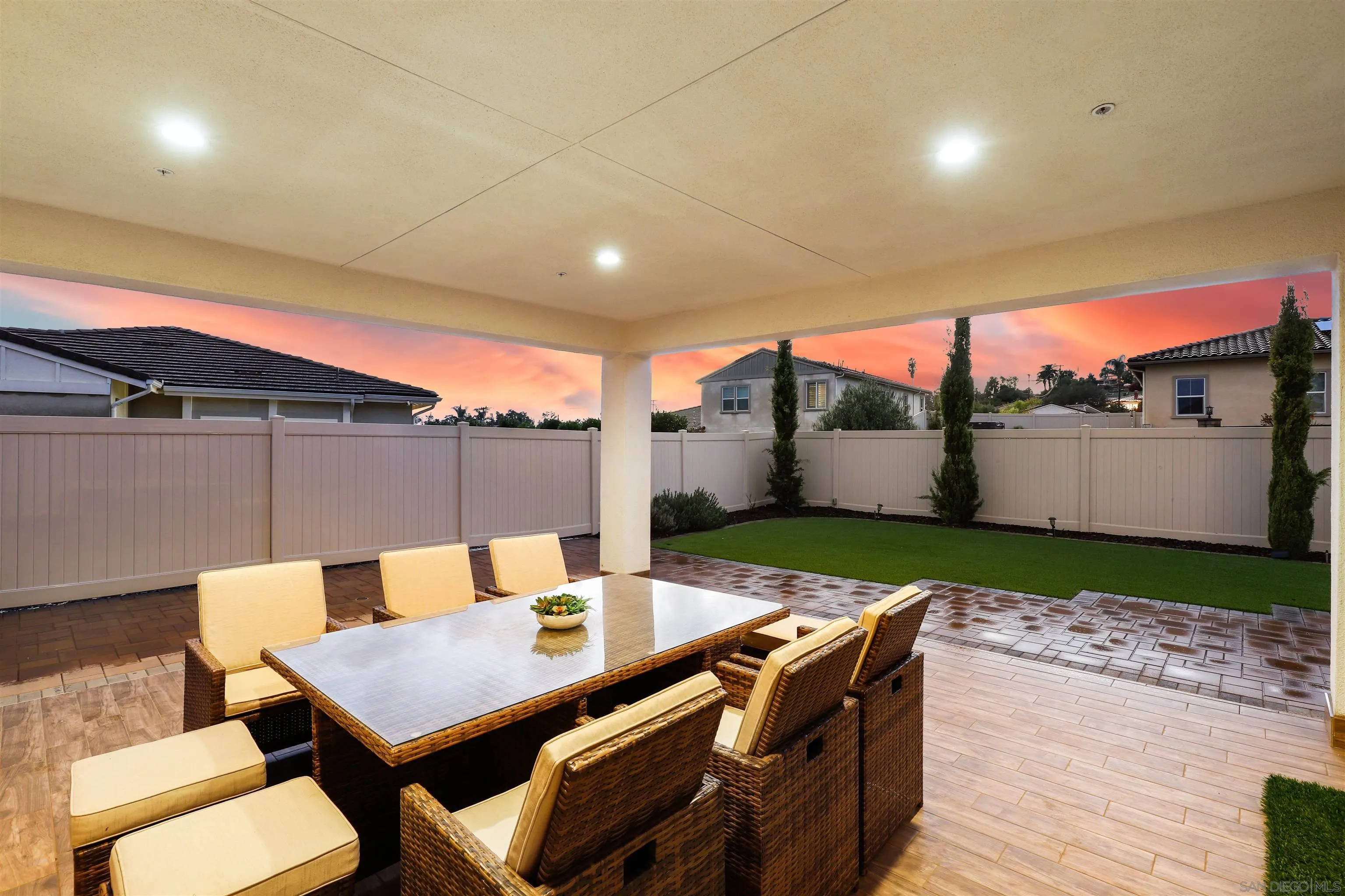 1294 Palomar Circle Escondido, CA 92027 - Photo 3 of 41 a patio with a table and chairs and potted plants