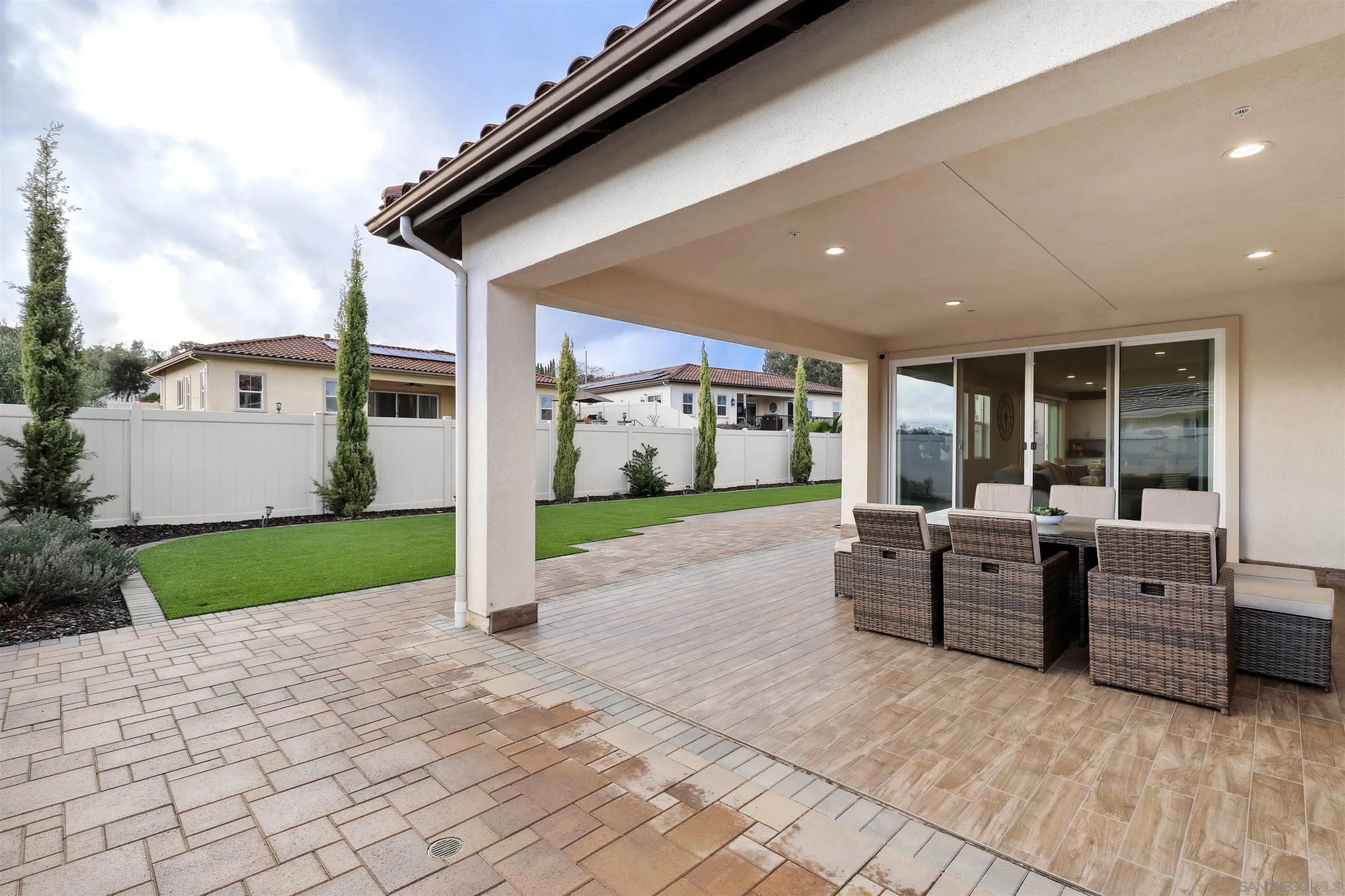 1294 Palomar Circle Escondido, CA 92027 - Photo 31 of 41 a view of a patio with couches chairs and potted plants