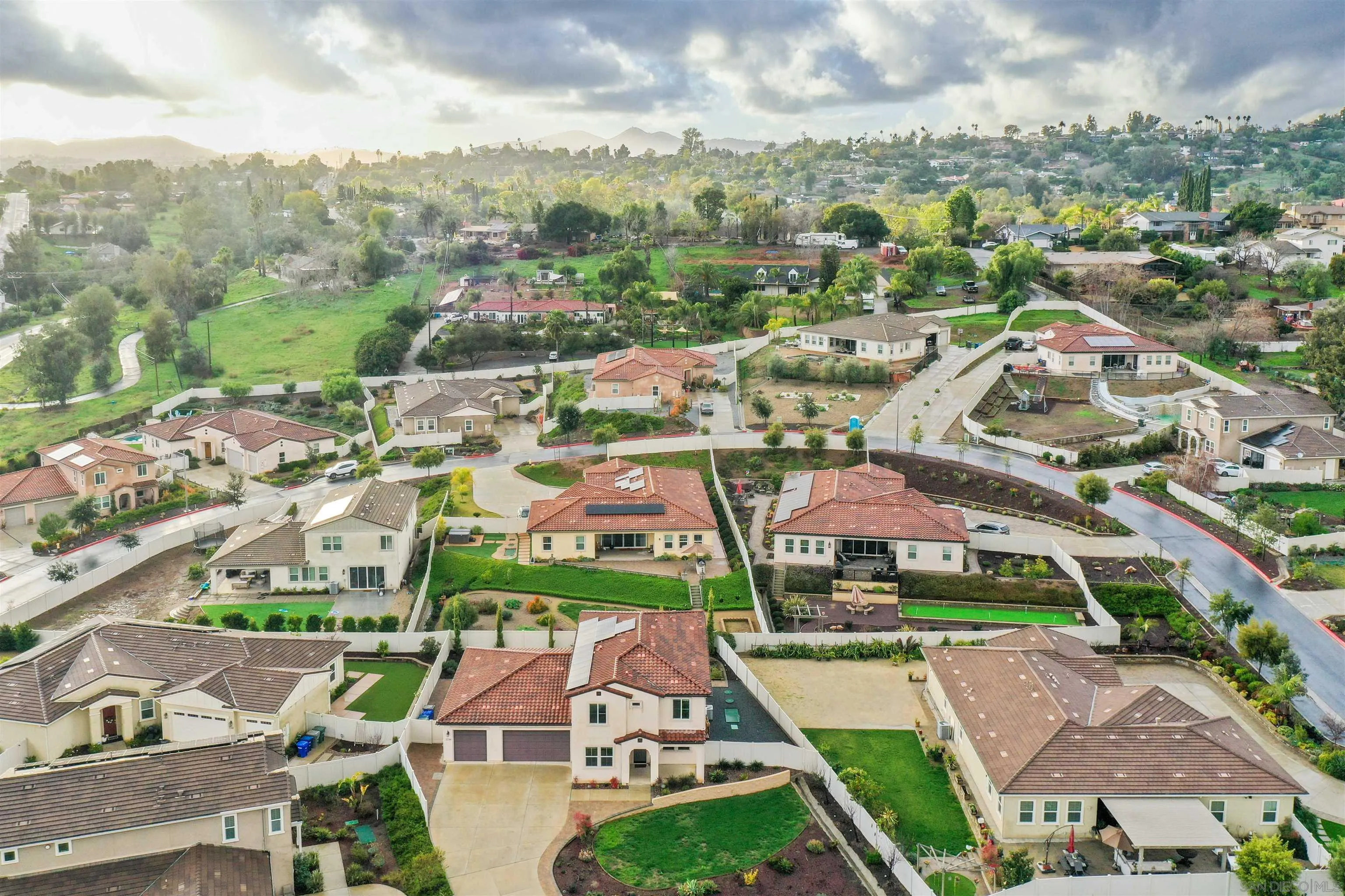 1294 Palomar Circle Escondido, CA 92027 - Photo 7 of 41 an aerial view of multiple houses with yard