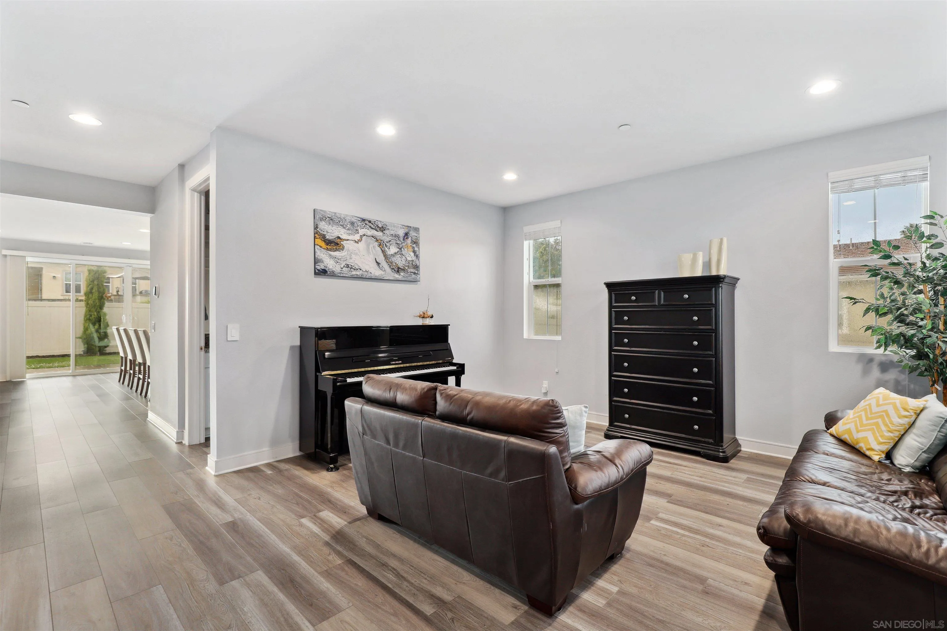 1294 Palomar Circle Escondido, CA 92027 - Photo 8 of 41 a living room with furniture and a flat screen tv