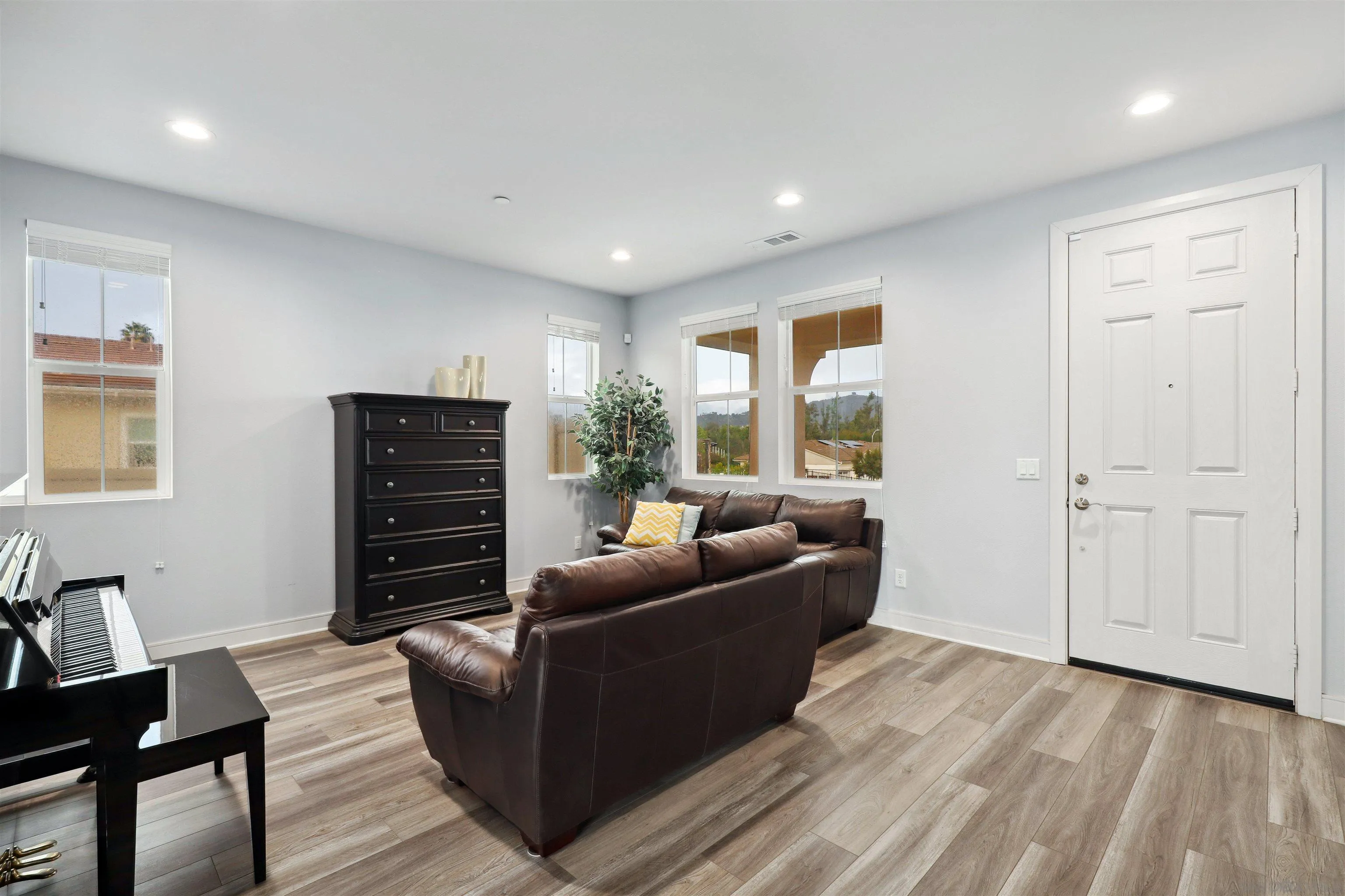 1294 Palomar Circle Escondido, CA 92027 - Photo 9 of 41 a living room with furniture and a large window